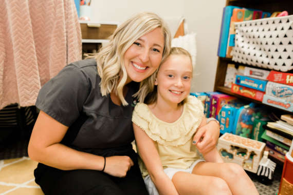 Therapist with child in session